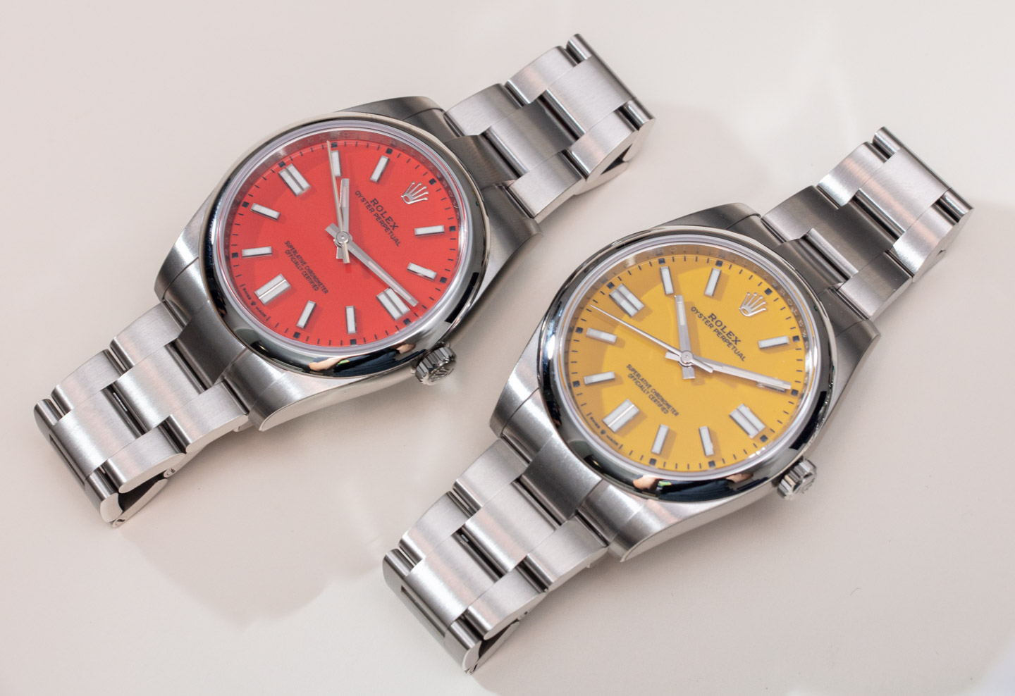 So sánh đồng hồ Rolex Oyster Perpetual 41 màu đỏ san hô với mặt số màu vàng